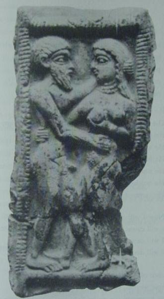 baked clay image of a couple mating